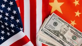 US, China flags and money